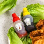 طقم زجاجات صوص ميني محمولة قابلة للضغط (قطعتين).