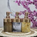 موزع صابون وشامبو سائل بتأثير رخامي (Marbled Dispenser) مع مضخة روز جولد.