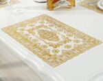 ⁦مفرش طاولة دائري مطرز باللون الذهبي بتصميم زهور وفراشات (Round Embroidered Table Mat / Doily).⁩ - الصورة ⁦3⁩