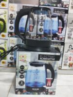 ⁦توضح الصورة عبوات غلايات مياه كهربائية زجاجية (Electric Glass Kettle) من ماركة HOOR (هور)، وهذه أبرز مواصفاتها وخصائصها الظاهرة على العبوات:⁩ - الصورة ⁦2⁩