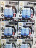 توضح الصورة عبوات غلايات مياه كهربائية زجاجية (Electric Glass Kettle) من ماركة HOOR (هور)، وهذه أبرز مواصفاتها وخصائصها الظاهرة على العبوات: